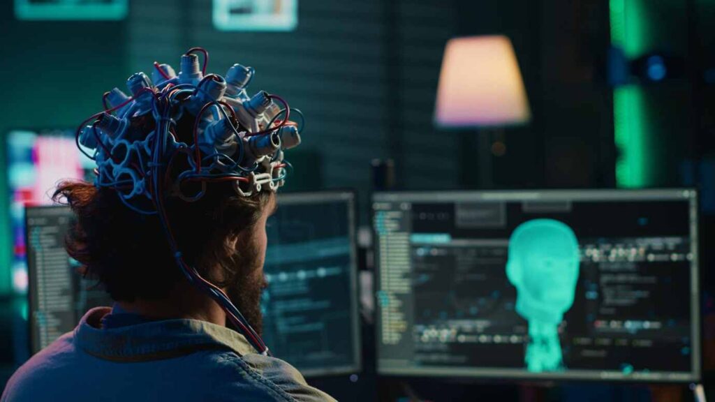 A man adjusting intricate wires