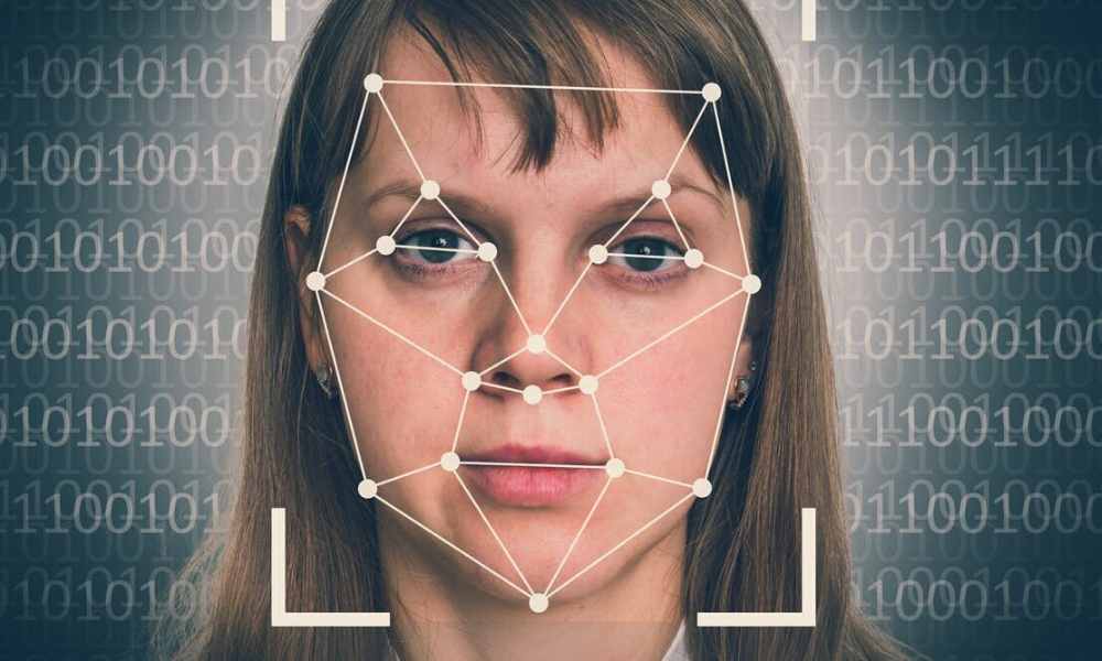 Woman's face with digital facial recognition mapping