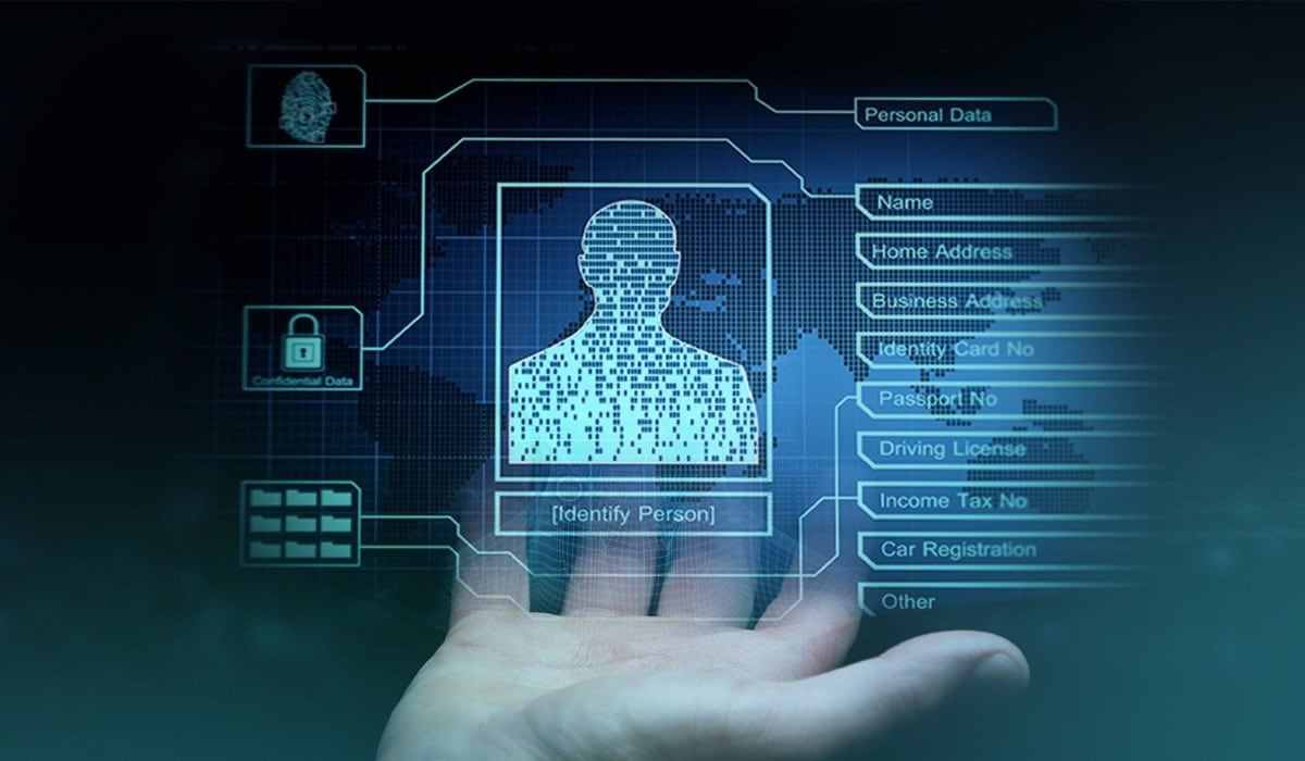 Hand interacting with a digital holographic display of personal data