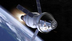 A spacecraft with solar panels orbiting Earth